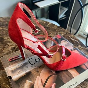 Brand new never worn Coutgo Heels size 7